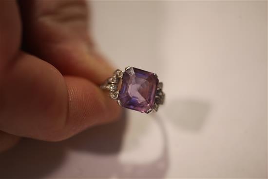 A 1920s/1930s platinum, amethyst and diamond ring, size O.